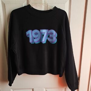 Bella Canvas Black Crewneck Sweatshirt with Blue & Purple 1973 Graphic